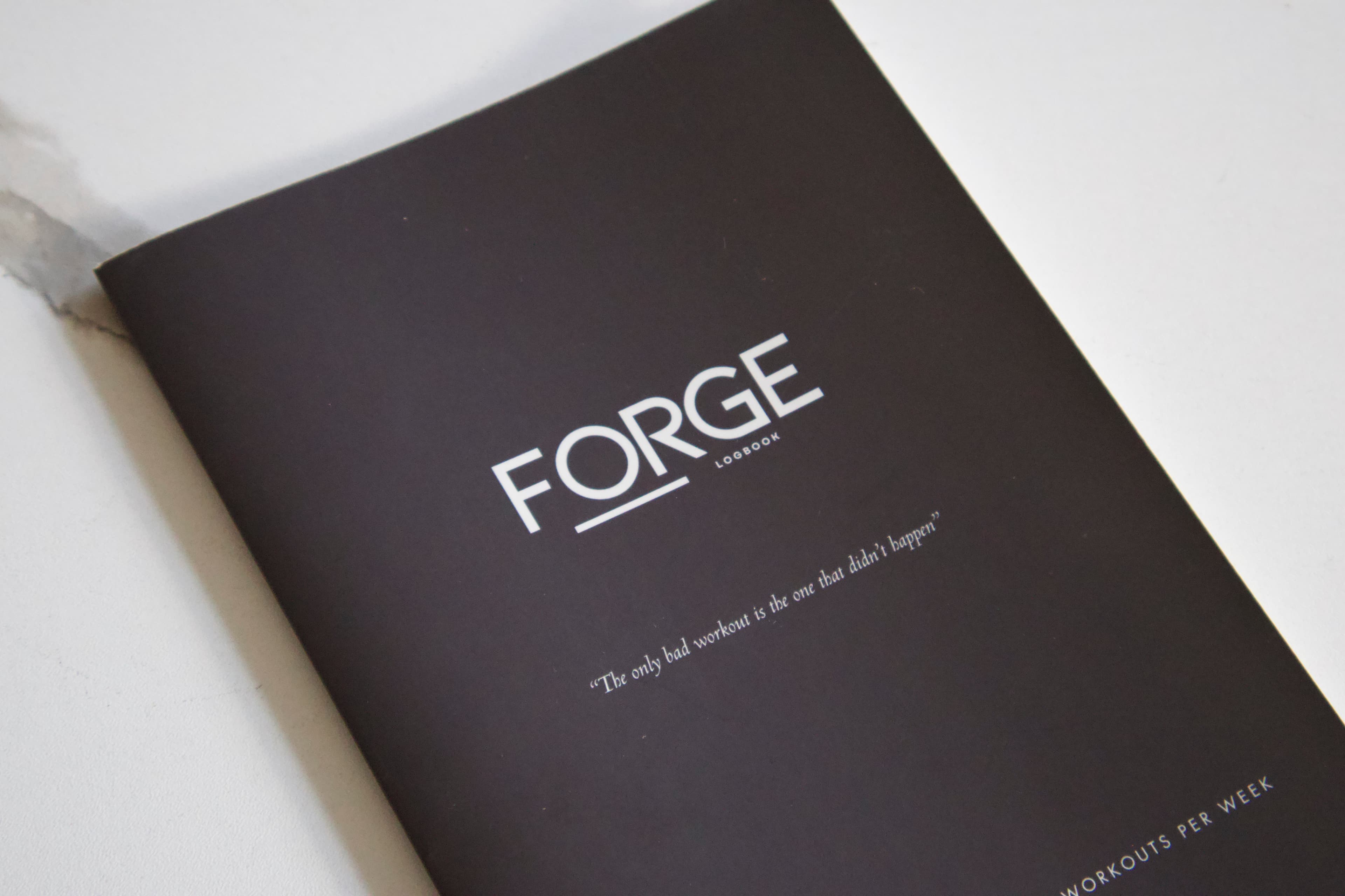 Athlete tracking GZCLP workout with tier-based structure in ForgeLogbook