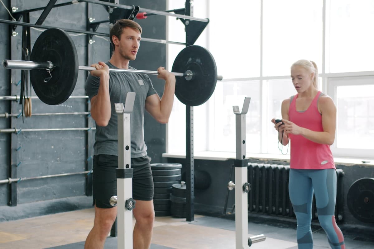 Bodybuilder training in a gym with focused intensity