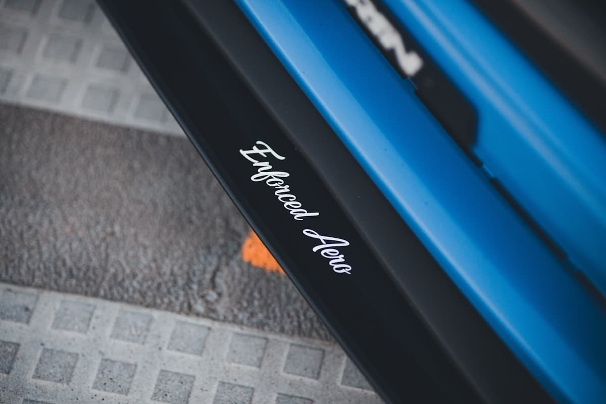 Powerlifter chalking hands before a heavy barbell lift in a gym