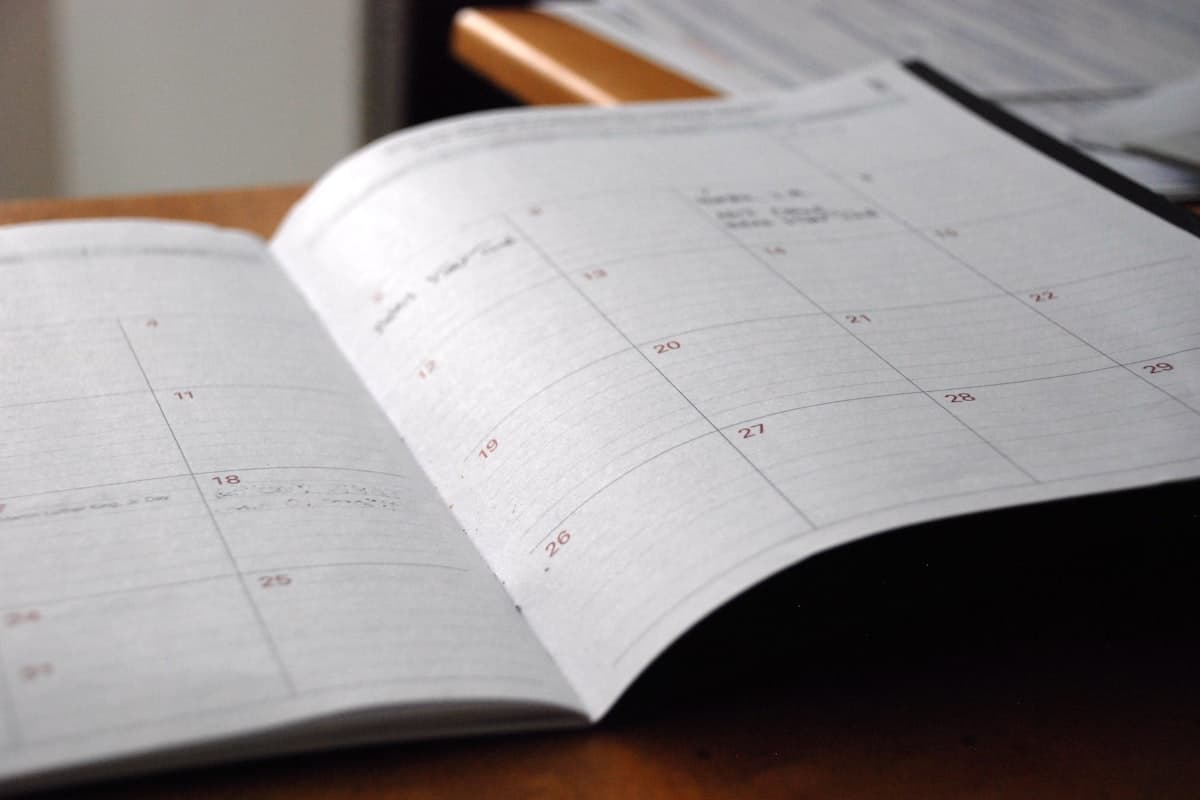 Training plan with periodized progression on a desk