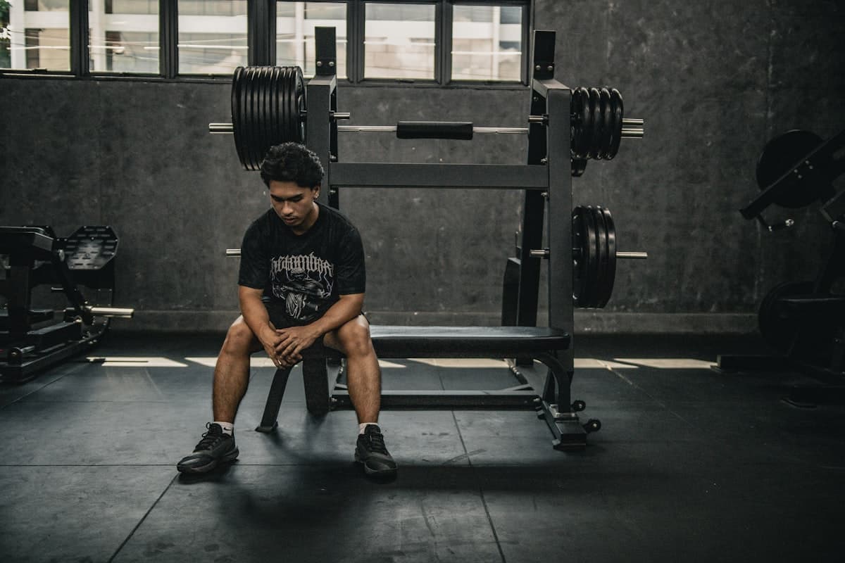 Lifter performing a heavy compound barbell movement
