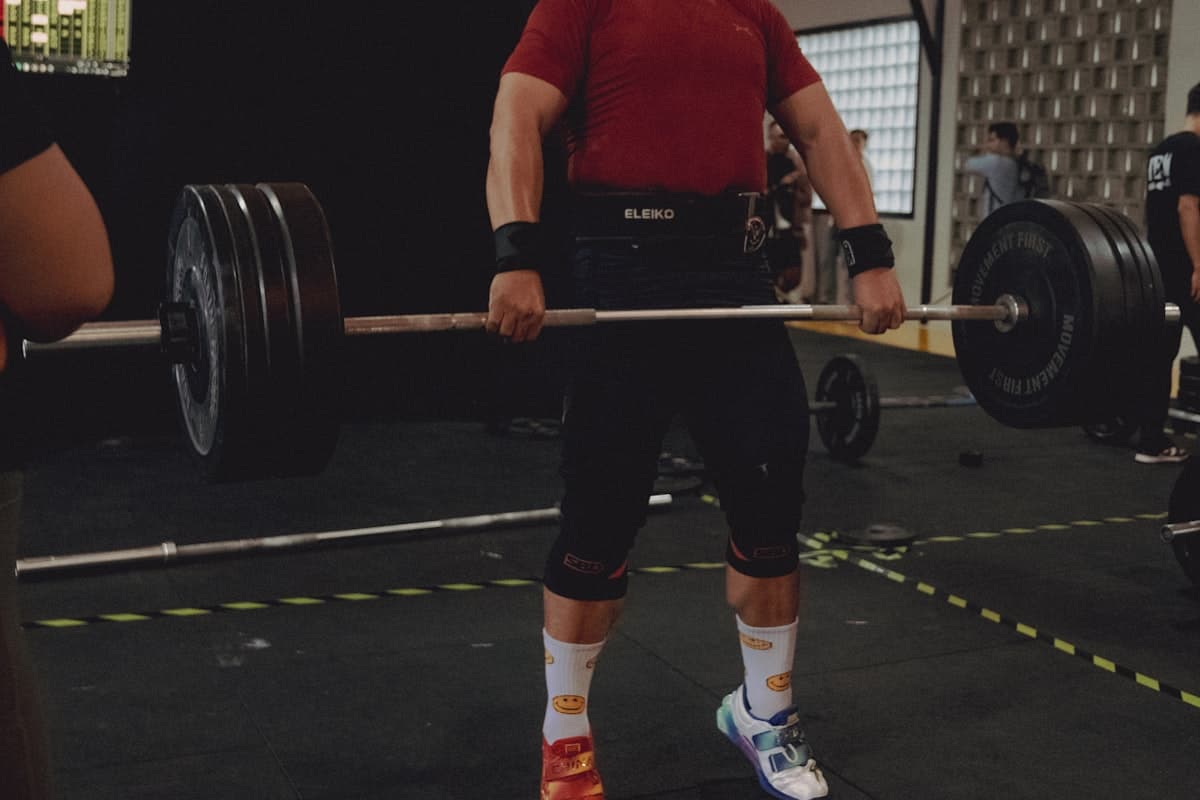 Heavy deep barbell squat at intense training volume