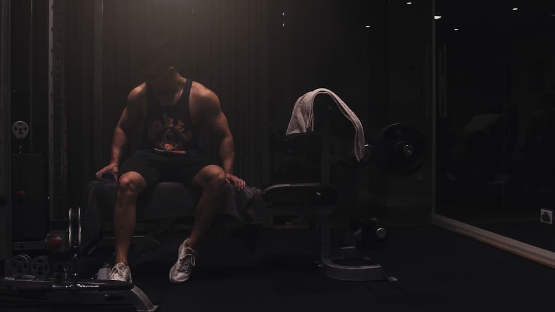 Powerlifting logbook with open page showing bench press training